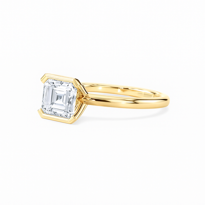 Bezel-Set Emerald Solitaire Ring