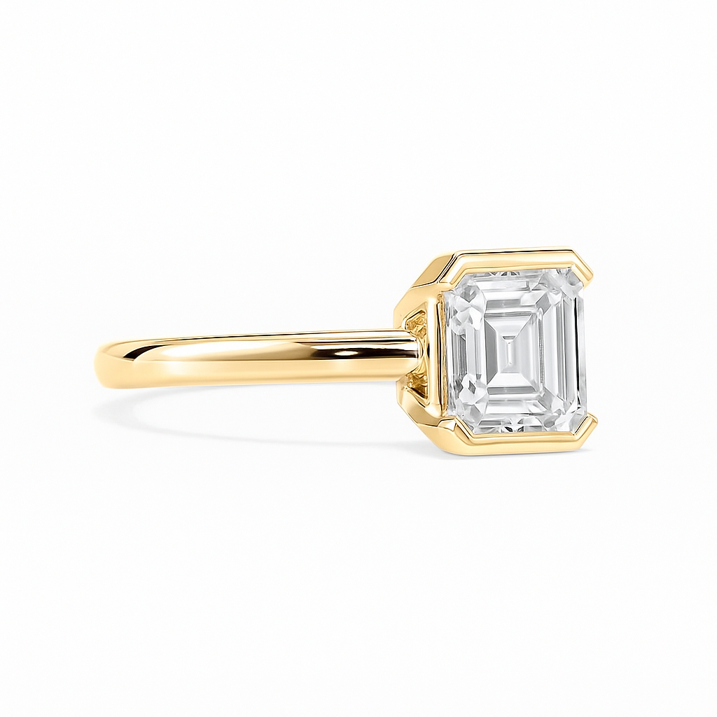 Bezel-Set Emerald Solitaire Ring