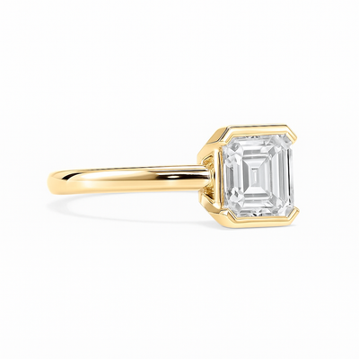 Bezel-Set Emerald Solitaire Ring